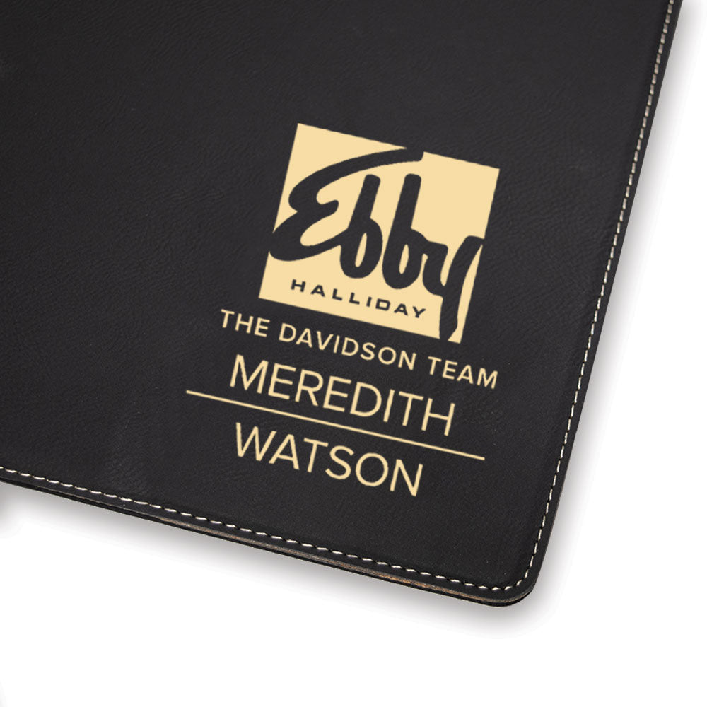 Custom engraved gold on black portfolio branded Ebby Halliday logo