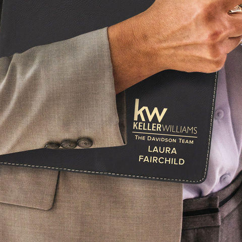 Custom engraved gold on black portfolio branded Keller Williams logo